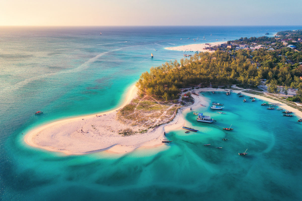 Aerial view of a Zanzibar sandbank and turquoise water at sunset