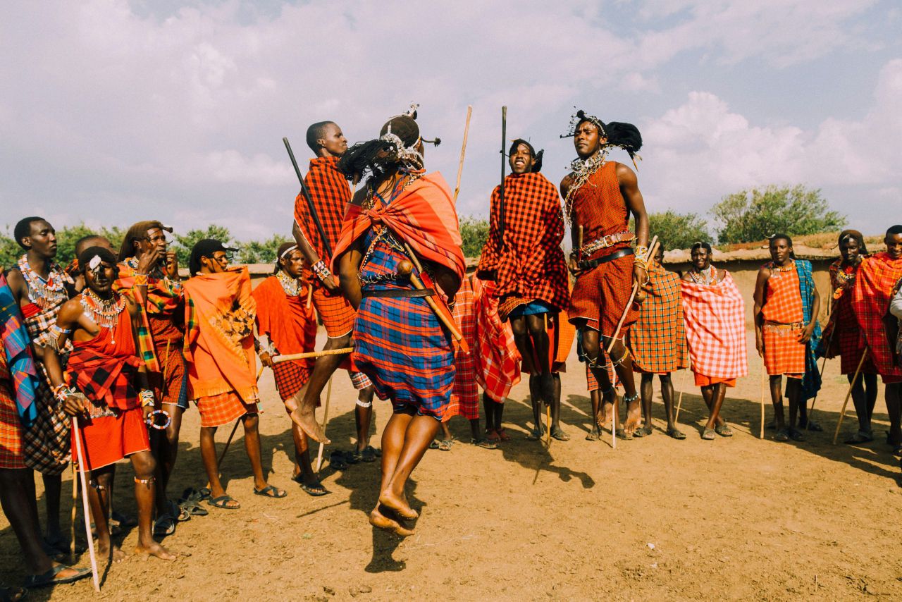 Maasai community members gathered for a traditional dance