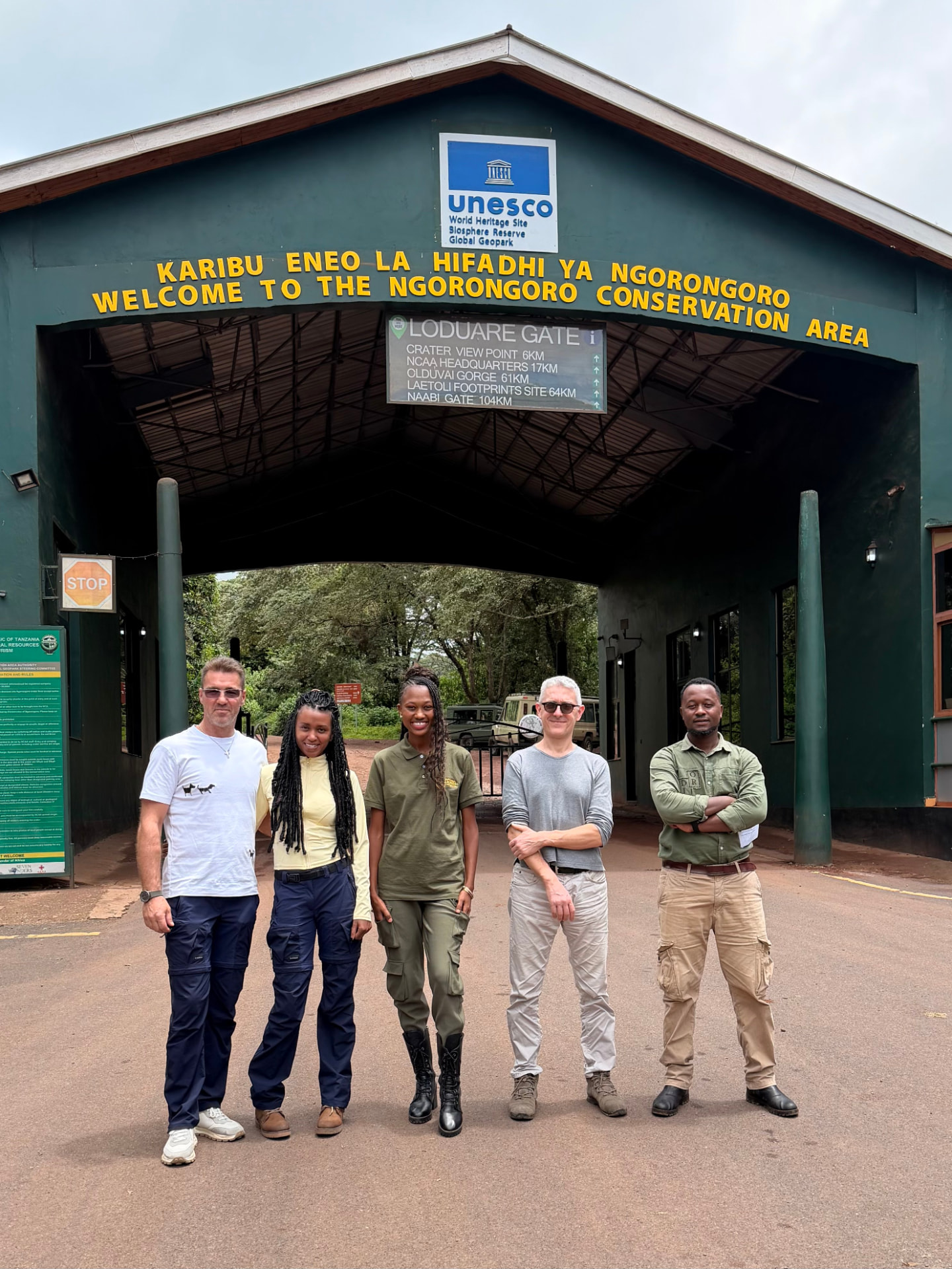 Noreen with guests and guides at the Loduare Gate of the Ngorongoro Conservation Area