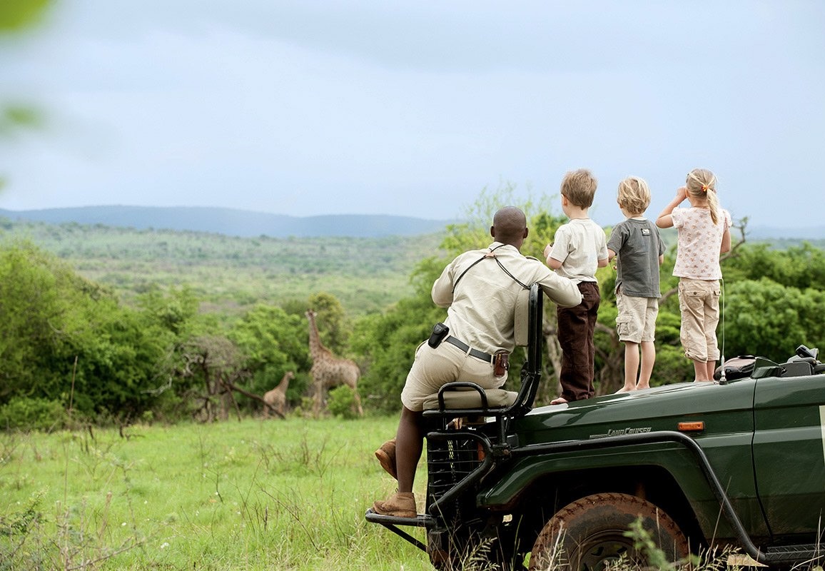 Family on a game drive in Tanzania